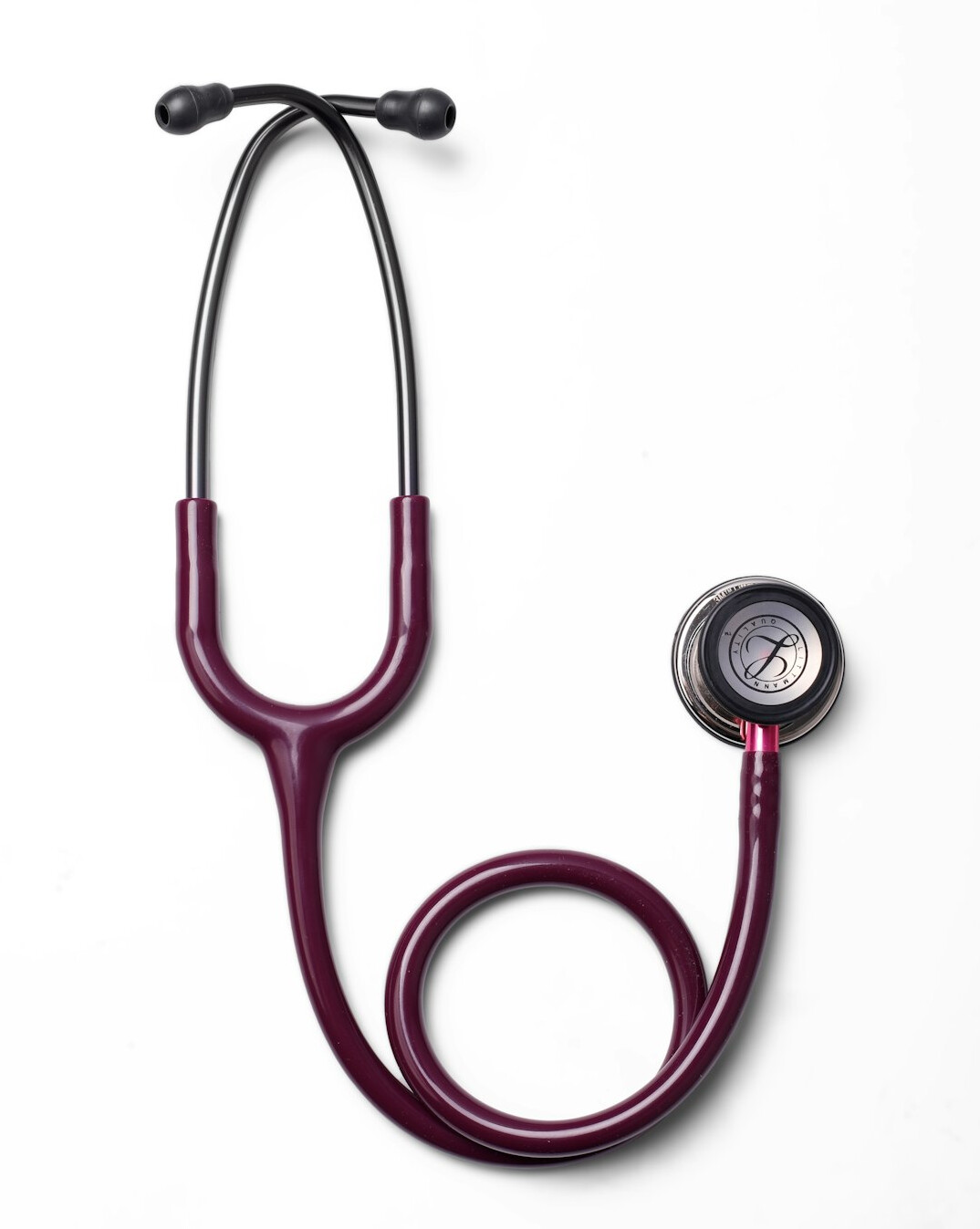 Stethoscope, notebook and tablet on a bright desk in a medical office