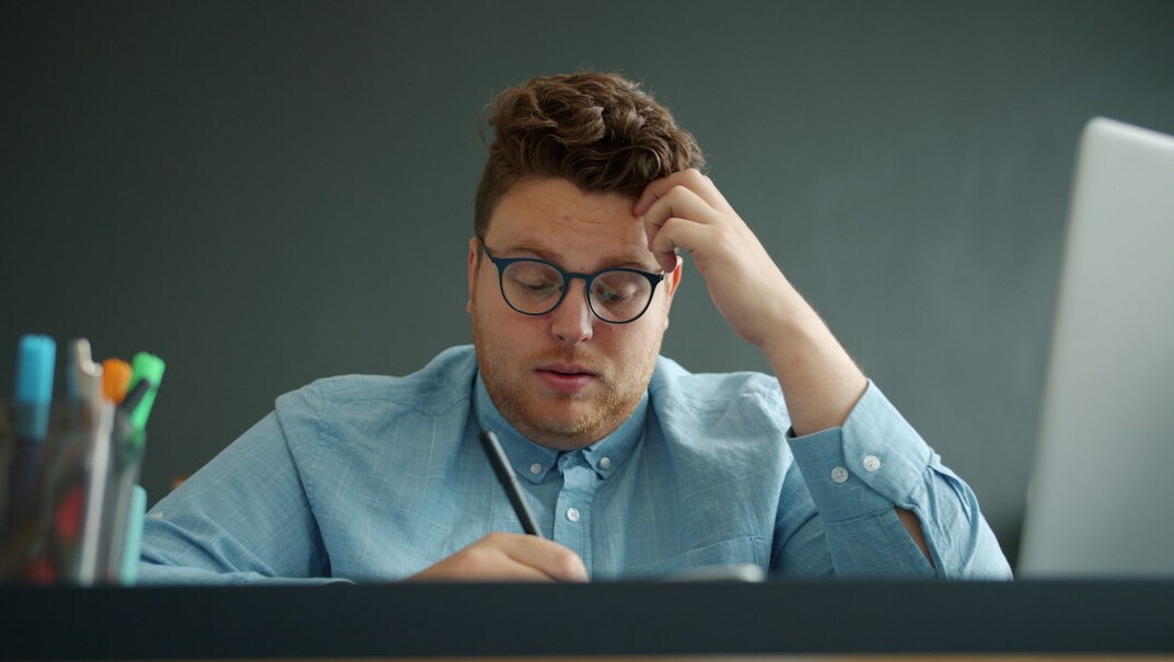 person feeling stressed at work